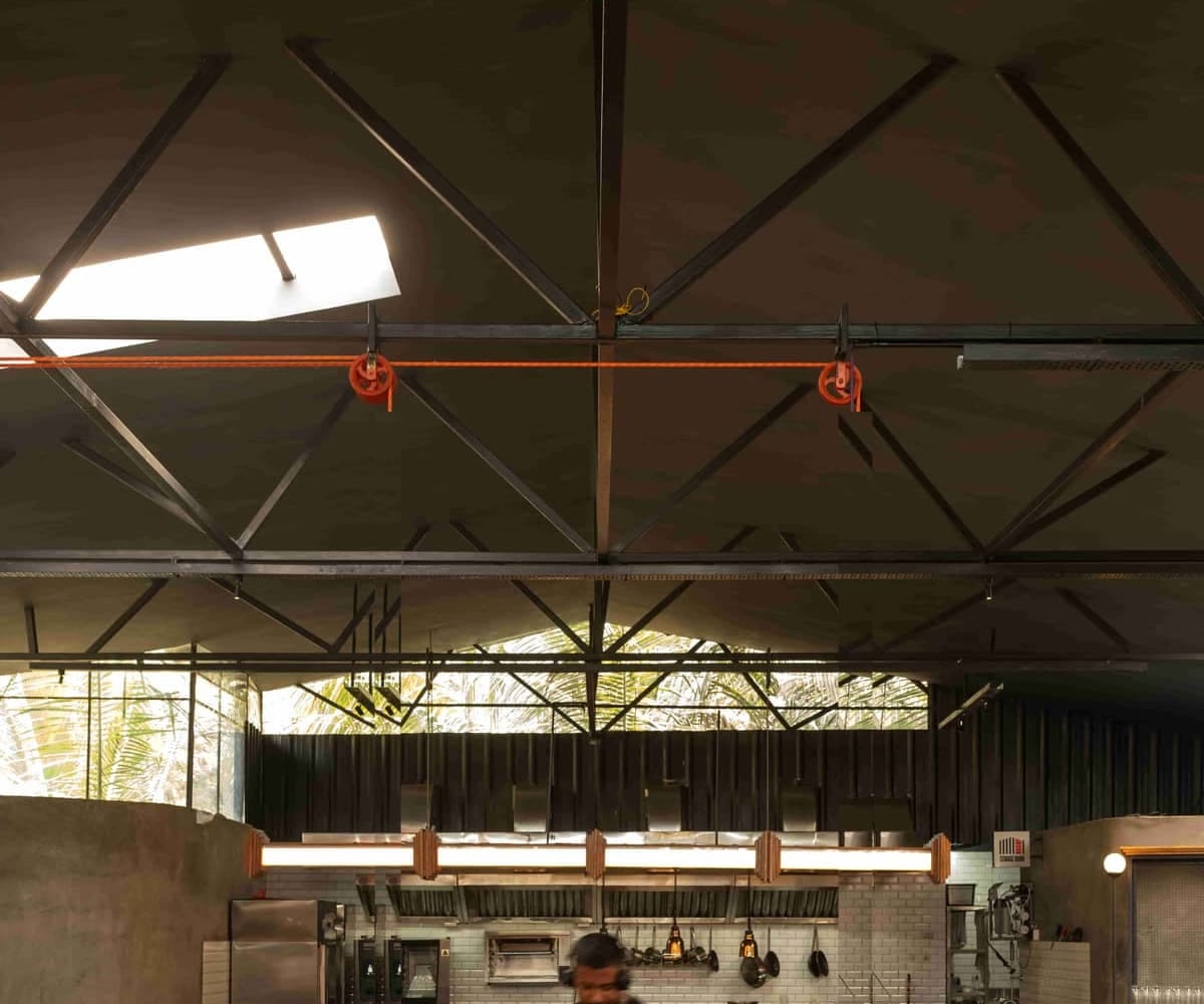The original roof truss with the skylight and two orange pulleys